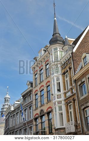 Colorful Architecture Of House Facades On Grote Gracht Street, With The City Hall (stadhuis) On The 