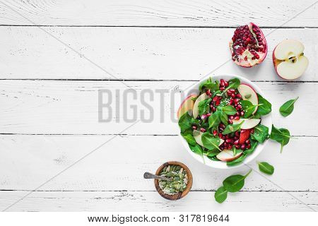 Spinach, Apple Salad With Pomegranate Seeds
