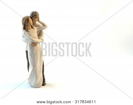 Figures - A Couple In Love. Figurines - He And She, Love Forever. Statuette - A Guy And A Girl Hug A