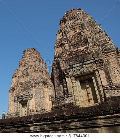 Stone Towers Of A Medieval Khmer Temple. Baray Eastern Mebon.