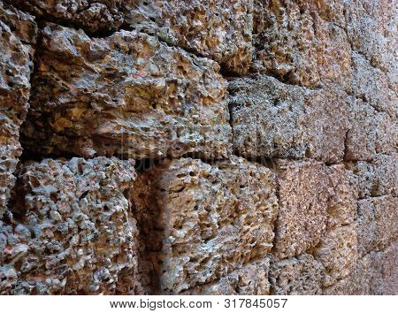Antique Stonework. Stone Wall As Background. Solid Surface