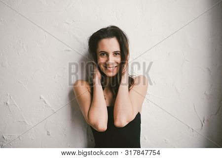 Portrait Of Young Sports Woman Of Athletic Build In Swimsuit. Woman Spend Time In A Dance Studio. Be