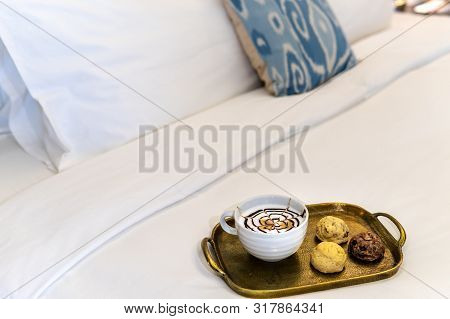 Cappuccino With Baked Goods On Tray