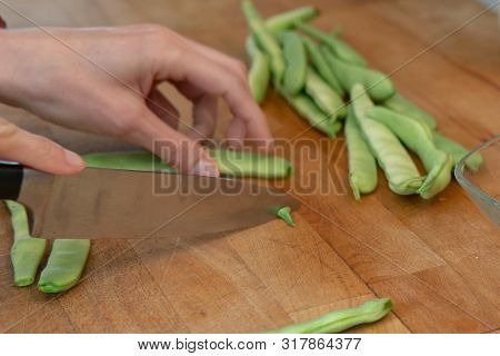 Cutting Large Green Snap Peas