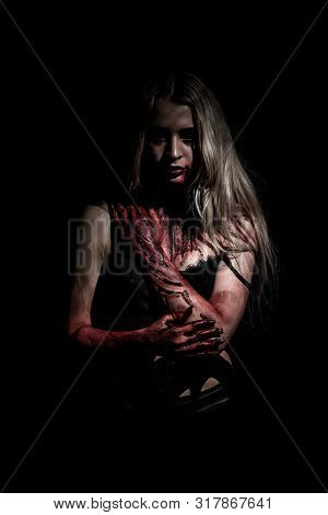 Scary Pale Bloody Woman Over Black Background