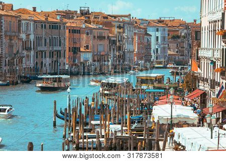 Venice, Italy - May 25, 2019: Gondolas At Grand Canal In Italy Summer Time