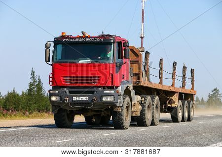 Novyy Urengoy, Russia - August 3, 2019: Offroad Semitrailer Truck Iveco Trakker At The Interurban Ro