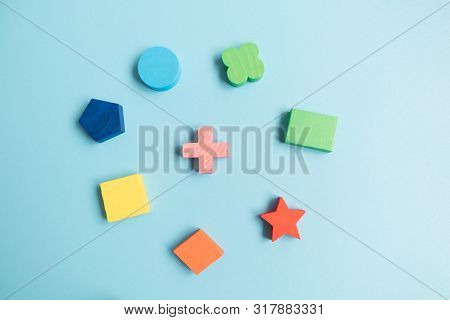 Top View Colorful Wooden Building Blocks With Different Shapes For Developing And Entertainment Of C