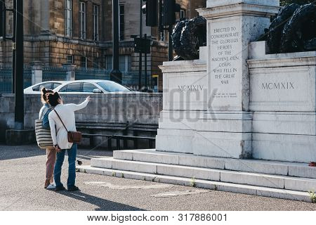 London, Uk - July 15, 2019: People Looking At Machine Gun Corps Memorial In London, Uk, Also Known A