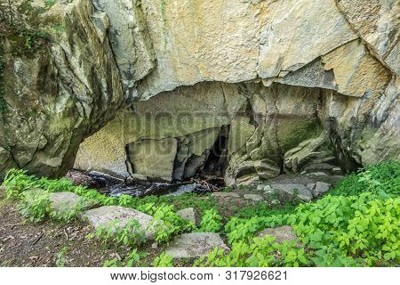Han-sur-lesse, Belgium - June 25, 2019: Grottes De Han. Spot Where Lesse River Enters The Cave Syste