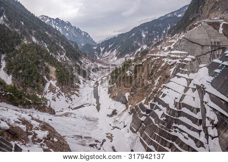 Scene Of Kurobe Dam Between Snow Wall At Tateyama Kurobe Alpine Route, Japan