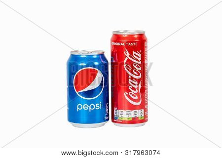 Riga, Latvia - August 19 ,2019 : 330ml Coca Cola And Pepsi Isolated On White Background