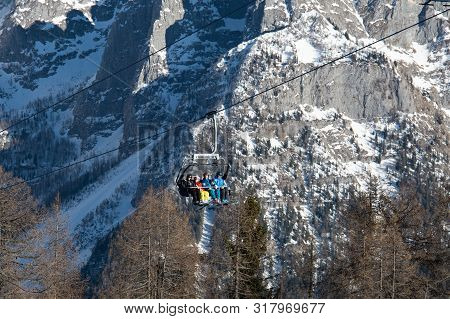 Ski Resort Folgarida Marilleva.folgarida Marilleva.italy.15.02.2019. People Rise On A Chair Lift.