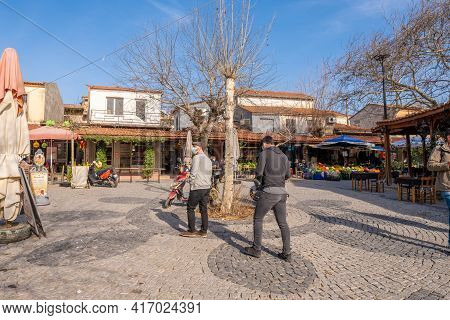Urla, Izmir, Turkey - 03.08.2021: People With Masks Walking On Town Center And Checking Around In A 