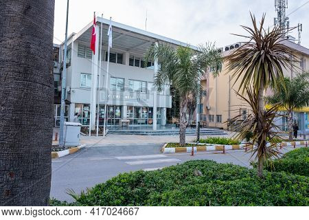 Urla, Izmir, Turkey - 03.08.2021: Urla Municipality Building And Some Palm Trees Around