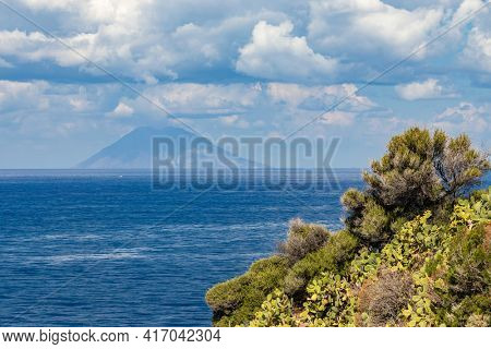 Rock cliff of cape Capo Vaticano with Aeolian Islands, Tyrrhenian Sea, Calabria, Southern Italy