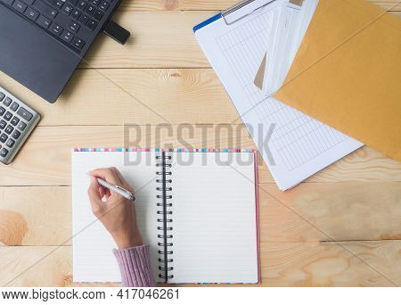 Olympus Digital Camerawork At Home Because Covid-19 Or Corona Virus With Hand Woman Writing On Book 