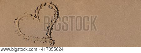 Heart Drawn On The Sand By Sea Closeup Background