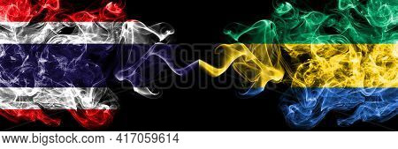 Thailand, Thai Vs Gabon, Gabonese, Gabonian Smoky Mystic Flags Placed Side By Side. Thick Colored Si