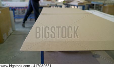 One Of The Stages Of Packaging Furniture In The Furniture Industry. Furniture Packed In A Box. Stock