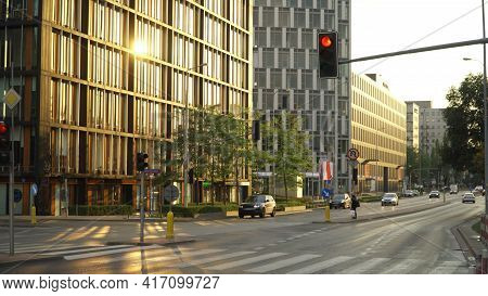 Warsaw, Poland 20.03.2020 - Empty Domaniewska Street In Warsaw, Poland. Red Signal Light And Golden 