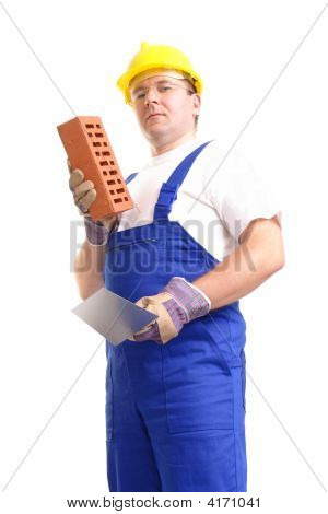 Builder avec briques et truelle