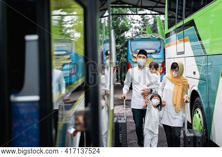 Muslim Holiday Trip Riding A Bus Together With Family