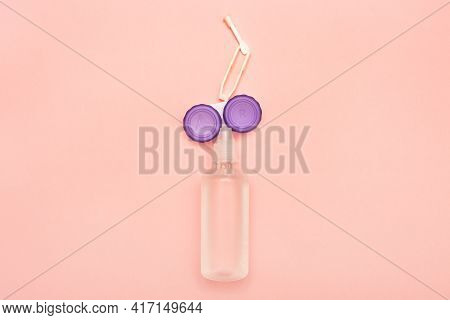 Contact Lens Care Accessories. Solution, Container, Tweezers, And Suction Cup For Contact Lenses.
