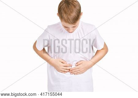 Children Portrait In White T-shirt. Studio Isolated Concept. Lower Back Problem. Health Care. Bad Be