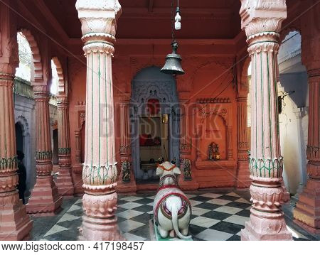 Varanasi, India - November 01, 2016: Interior Of A Hindu Temple With Pillars, Stone Diety Bull Nandi