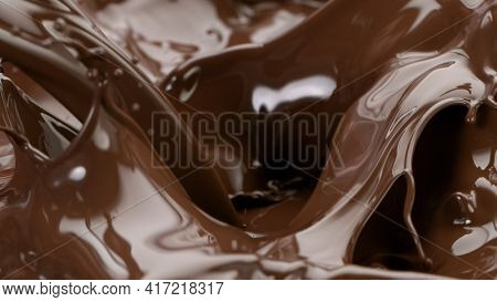 Splashing hot chocolate texture, close-up.