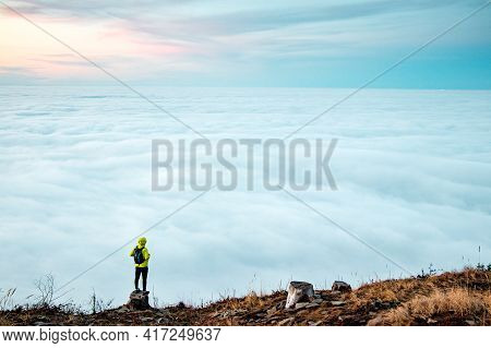 Amazing Panorama Of Clouds Floating All Over The Territory And A Persistent Boy Of 20-25 Years Stand