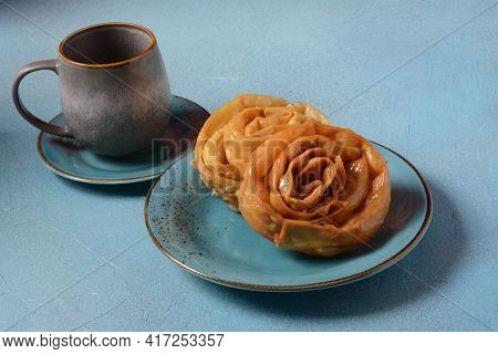 Fresh Baked Chebakia For Ramadan. Chebakia Moroccan Pastries. Made Of Strips Of Dough Rolled To Rese