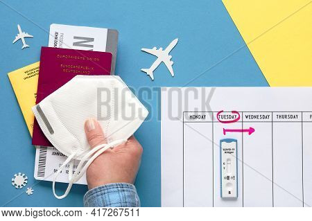 New Normal Travel During Covid-19 Restrictions. Hand With Pack Of Documents - Vaccination Certificat