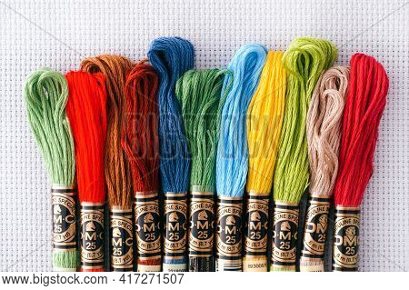 Tambov, Russian Federation - October 20, 2020 Different Colors Dmc Six Strand Floss In A Row On Whit