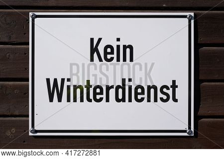 Sign On A Path With The Inscription No Winter Service (kein Winterdienst)