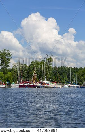 Masuria, Poland - June 24, 2020: A Typical Yacht Marina On The Masurian Lakes, Yachts Moored At The 