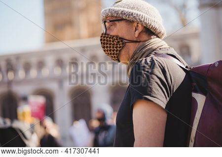 Westminster, London | Uk -  2021.04.17: An Older Gentleman Wearing A Mask Marching At The Kill The B