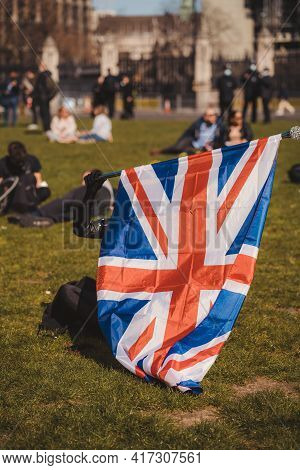 Westminster, London | Uk -  2021.04.17: Person Waving Union Jack British Uk Flag At The Kill The Bil