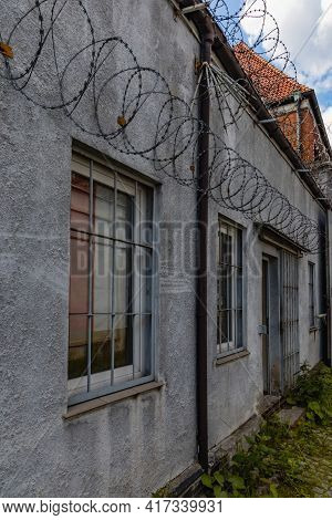 Walbrzych, Poland - June 15 2020: Facade Of Buildings Of Old Prison Custody