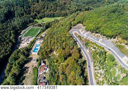 Winding Road Serpentine From A High Mountain Pass In The Rhine Village Bendorf Sayn Germany Aerial V