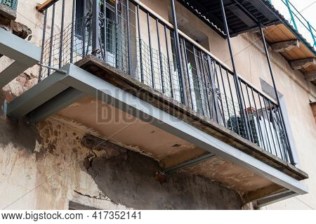 Reconstruction Of The Balcony. Metal Structure To Strengthen Dilapidated Balcony. High Quality Photo