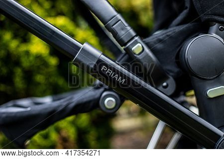Budapest, Hungary - April 18, 2021: Cybex Priam Black Stroller Or Pram In The Park. Infant Carriage