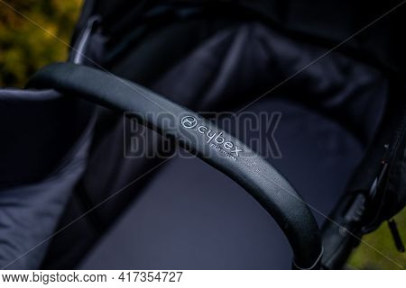 Budapest, Hungary - April 18, 2021: Cybex Priam Black Stroller Or Pram In The Park. Infant Carriage