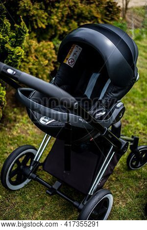 Budapest, Hungary - April 18, 2021: Cybex Priam Black Stroller Or Pram In The Park. Infant Carriage