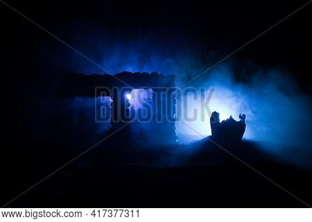 Old Ruined Stone House In Deserted Garden At Night. Selective Focus