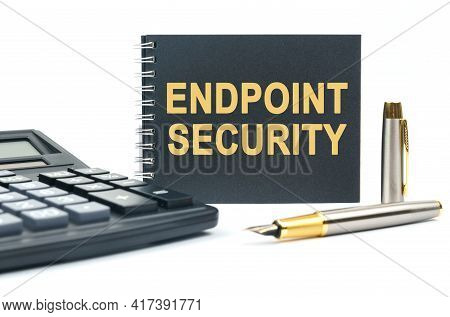 Business And Finance. On A White Background, There Is A Calculator, A Pen And A Black Notebook With 