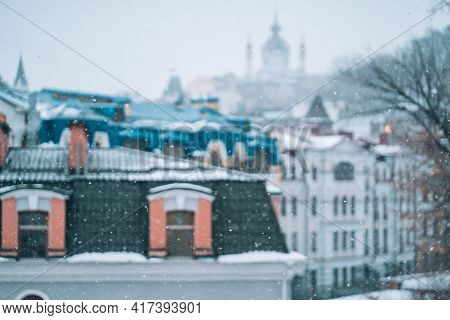Copious Snowfall Over The City With The Roofs