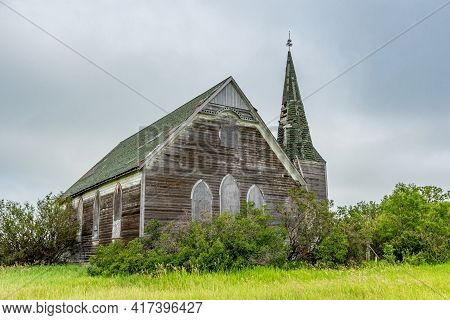 Dramatic Sky Over The Historic Yet Abandoned Froude Presbyterian Church In Froude, Sk