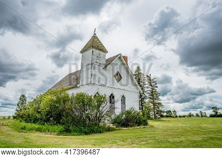 Dramatic Sky Over The Historic Yet Abandoned Trossachs United Church In Trossachs, Sk